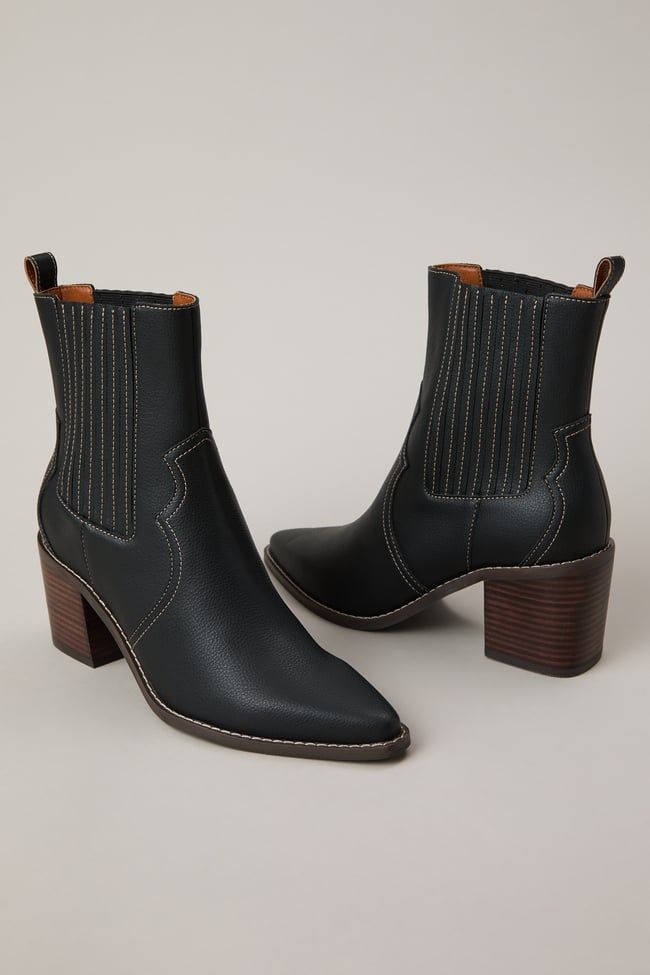 These edgy booties blend classic western style with a modern twist. The PCD side gore panels offer a comfortable, flexible fit, while the western-inspired details add a touch of rugged charm. Western Style Booties For Rodeo In Fall, Western Chelsea Boots With Stacked Heel For Fall, Western Chelsea Ankle Boots For Fall, Western Heeled Boots With Heel Pull Tab For Fall, Western Style Chelsea Ankle Boots For Fall, Western Style Heeled Boots For Fall Workwear, Chelsea Boots With Heel Pull Tab For Fall, Fall Ankle Boot Booties For Rodeo, Fall Western Ankle-high Chelsea Boots