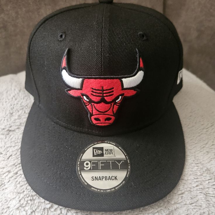 the chicago bulls snap back hat is on display