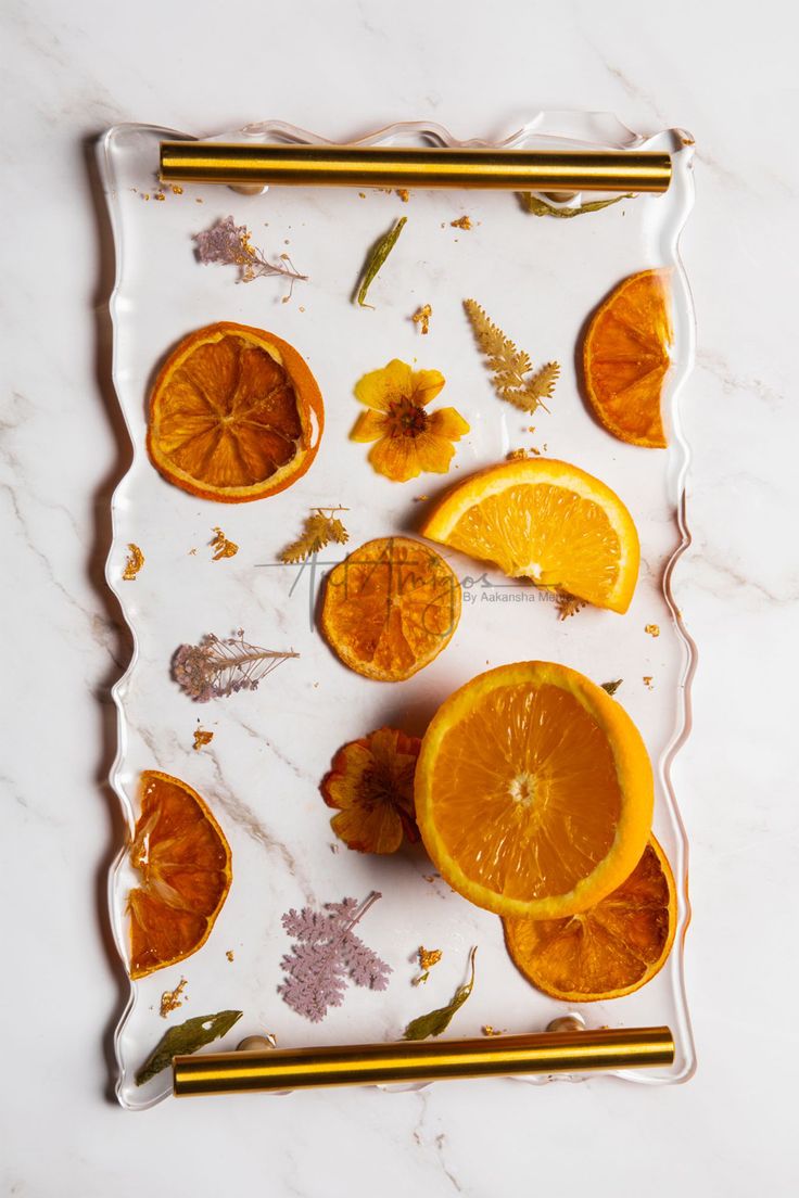 oranges are cut up and placed on a plate