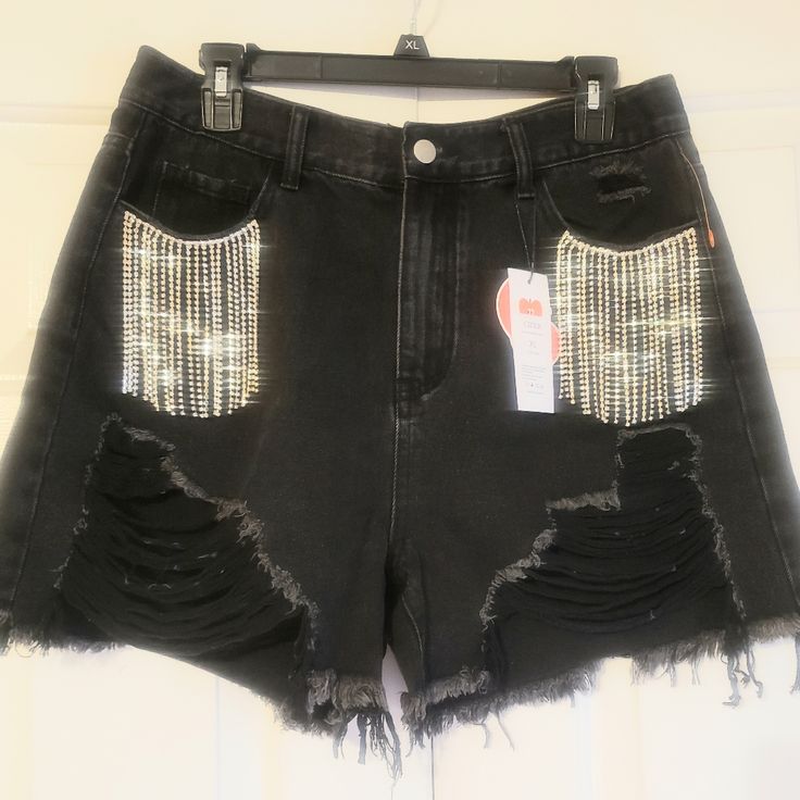 Nwt Cider Black Distressed Shorts With Rhinestones. You Will Surely Turn Heads With These On. Size Xl. Glamorous Black Bottoms With Rhinestone Fringe, Trendy Embellished Shorts For Night Out, Short Rhinestone Bottoms For Night Out, Black Rhinestone Short Bottoms, Black Rhinestone-embellished Short Bottoms, Black Rhinestone Embellished Short Bottoms, High Waist Shorts With Rhinestone Fringe For Night Out, Embellished Black Shorts, Short Bottoms With Rhinestone Fringe For Night Out