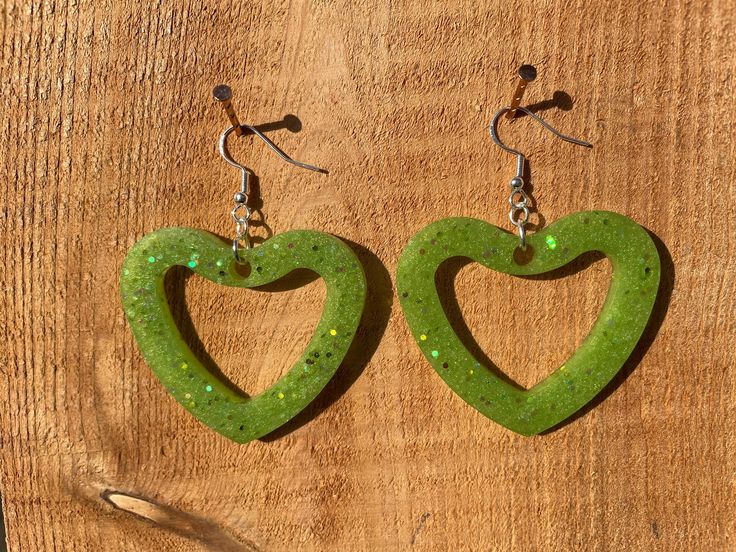 Big green hearts earrings with lots of glitters Green Heart-shaped Jewelry For Party, Green Heart-shaped Party Jewelry, Handmade Green Earrings For Valentine's Day, Green Glitter Earrings As A Gift, Cute Green Jewelry For Party, Green Heart Drop Earrings For Gifts, Green Heart-shaped Earrings For Valentine's Day, Green Heart Earrings For Valentine's Day Party, Green Heart-shaped Earrings For Gifts