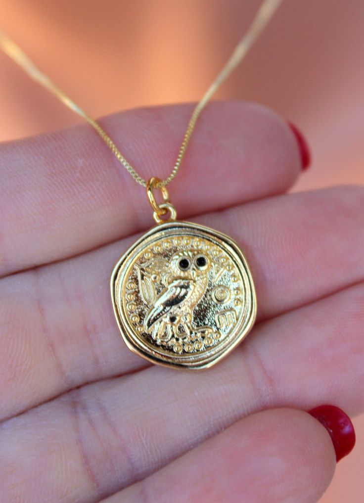 "This is a beautiful 14k gold filled owl charm necklace. This cute ancient owl coin is 14k gold filled, has black crystal eyes and measures 18mm. Comes on a 14k gold filled, 18\" length, .08mm fine box chain with spring clasp. Such a pretty charm necklace she is sure to love! Comes in a cute gift box ready to present! Please message me if you have any questions. Thank you!" Coin Shaped Amulet Jewelry Gift, Coin-shaped Amulet Jewelry For Gifts, Coin-shaped Amulet Jewelry Gift, Coin Shaped Charm Necklace For Gift, Coin Shaped Charm Necklace Gift, Coin Shaped Jewelry With Coin Pendant For Gift, Coin Pendant Jewelry Perfect For Gifting, Tarnish-resistant Coin Charm Necklace Gift, Gold Coin-shaped Jewelry With Charms