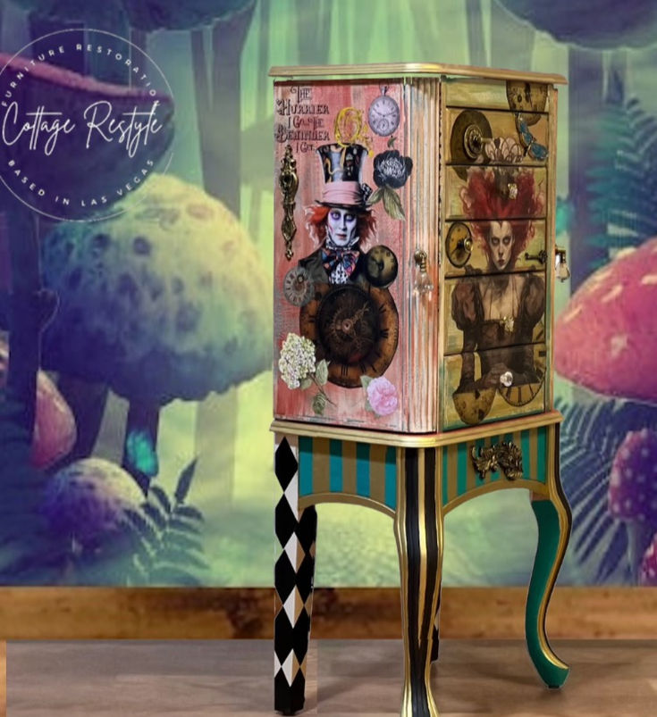 an artistically designed jewelry box sitting in front of a wall with mushrooms on it