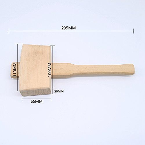 a wooden mallet is shown with measurements