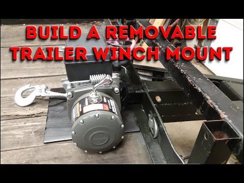 a trailer with the words build a removable trailer winch mount on it's side