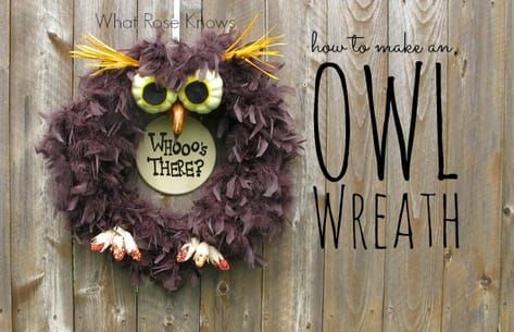 an owl wreath hanging on a fence with the words what does it mean? written below