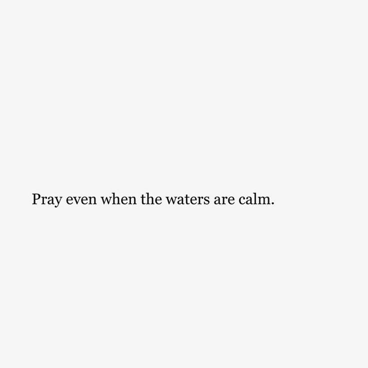 a white wall with the words pray even when the waters are calm in black ink