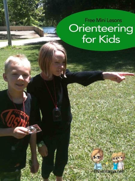 two children standing in the grass pointing at something