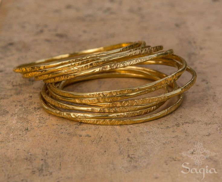 Handmade gold plated bracelet bangle from my 'Byzantin Collection', inspired by ancient Moroccan jewelry. As you can see in the photos the bangle has some hammered parts and some smooth parts to it. Gentle bracelet with antique look. wear as a single bracelet or few of them together. *this listing price is for 1 bracelet, you can order a single bracelet or more.. Made from brass coated with 24 karat gold (nickel free). Measurements: Diameter: 60mm / 2.36'' Thickness: 2.4mm / 0.09'' Bracelet Weig Moroccan Bracelet, Gold Bracelet Bangle, Gold Bracelets Stacked, Gold Minimalist Jewelry, Single Bracelet, Hammered Bracelet, Hammered Bangles, Moroccan Jewelry, Boho Bangle