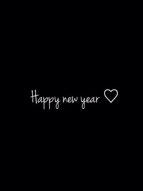 a black background with the words happy new year written in white on top of it