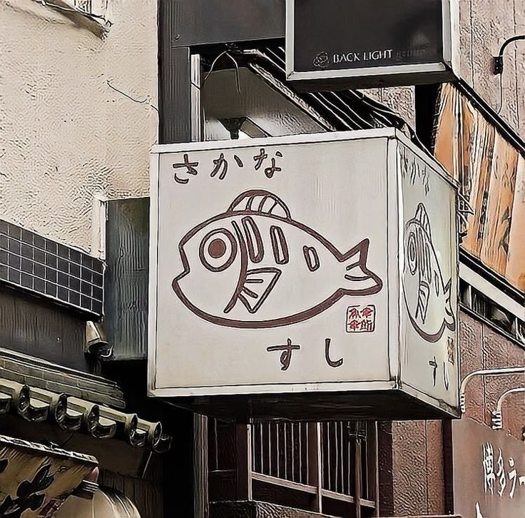 a fish sign on the side of a building