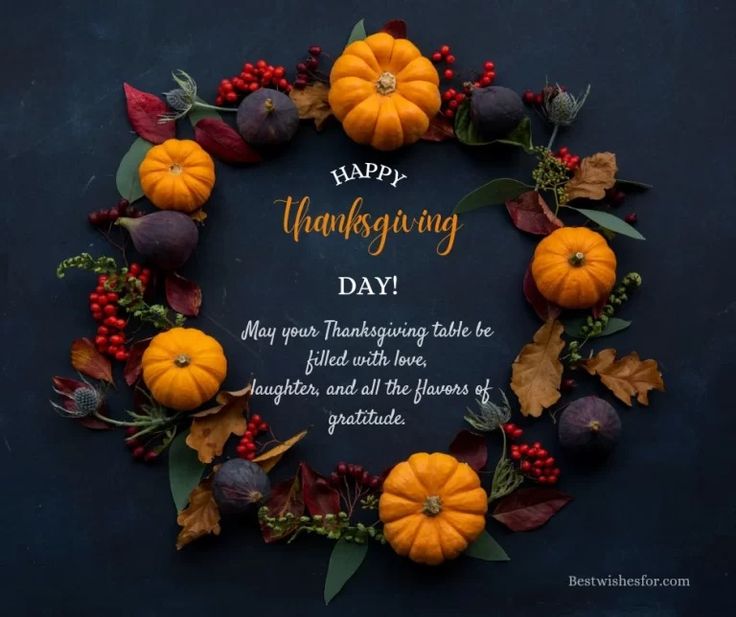 a thanksgiving wreath with pumpkins and berries around it on a dark background that says happy thanksgiving day