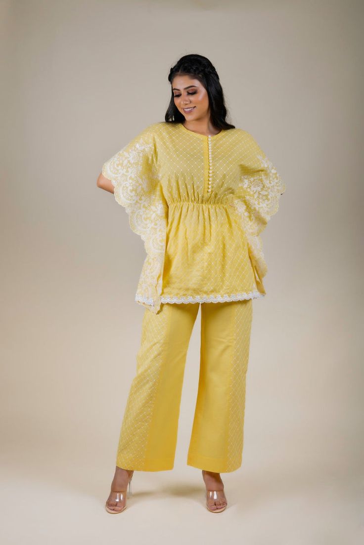 Elegant Cotton Palazzo Set With Intricate Embroidery, Elegant Yellow Sharara With Floral Embroidery, Festive Spring Palazzo Set With Set-in Sleeves, Festive Cotton Pant Set With Floral Embroidery, Elegant Embroidered Top For Eid, Spring Festive Pant Set With Intricate Embroidery, Elegant Pant Set With Intricate Embroidery For Spring, Elegant Spring Pant Set With Intricate Embroidery, Elegant Yellow Sets With Resham Embroidery