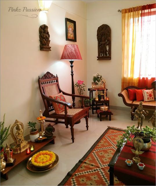 a living room filled with lots of furniture and decor on top of a white floor