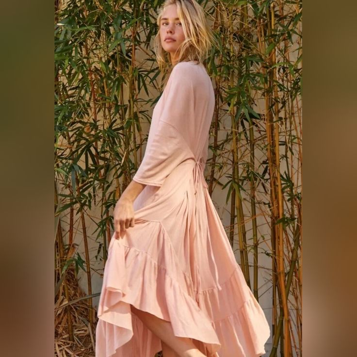 Free People Sun Seeker Maxi Dress Size Xs So Comfy Maxi Dress From Our Fp Beach Collection Featured In A Three-Quarter Sleeve Silhouette With Tie-Back Detailing And Tiered Hemline With Pleating For Added Shape Color: Washed Geranium (Soft Peachy-Pink) 100% Cotton Dropped Sleeves Rounded Hemline Scoop V-Neckline Oversized, Relaxed Fit Super Lightweight Material Measurements Approximately Lying Flat Unstretched, Shoulder To Shoulder 31" Armpit To Armpit 28" Waist 29" Armpit To Bottom Hem 31" *Bin Flowy Midi Dress For Spring Beach Cover-up, Spring Beach Cover-up Midi Dress With Short Sleeves, Spring Midi Dress With Short Sleeves For Beach Cover-up, Pink Breezy Beach Cover-up Dress, Breezy Pink Dress For Beach Cover-up, Spring Rayon Maxi Beach Dress, Flowy Spring Midi Dress As Beach Cover-up, Breezy Boho Dress For Brunch, Spring Brunch High-low Hem Dress