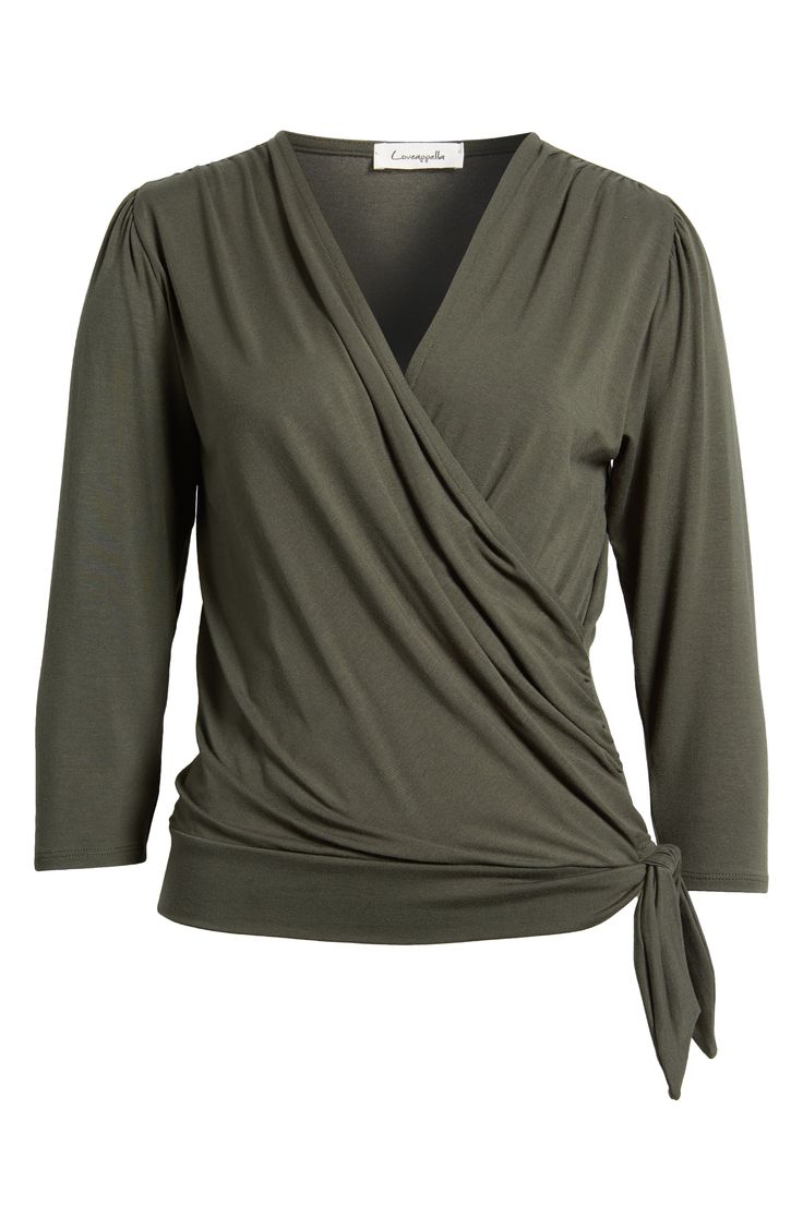 Cut from a soft, drapey jersey knit with an easy faux-wrap design, this top is an ideal choice for both casual looks or more styled up outfits. 23" length Surplice V-neck Three-quarter sleeves 95% rayon, 5% spandex Machine wash, dry flat Imported Solid Color V-neck Faux Wrap Top, Chic Wrap Tops For Loungewear, Versatile Viscose Tops For Loungewear, Solid Color Chic Wrap Tops, V-neck Faux Wrap Top For Layering, Versatile Wrap Top For Loungewear, Versatile Faux Wrap Top For Fall, Versatile Viscose Tops For Fall, Fall Surplice Neckline Tops