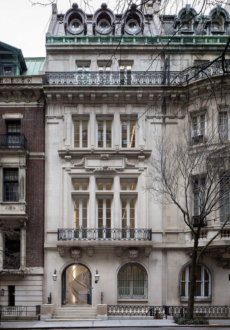 an old building with many windows and balconies