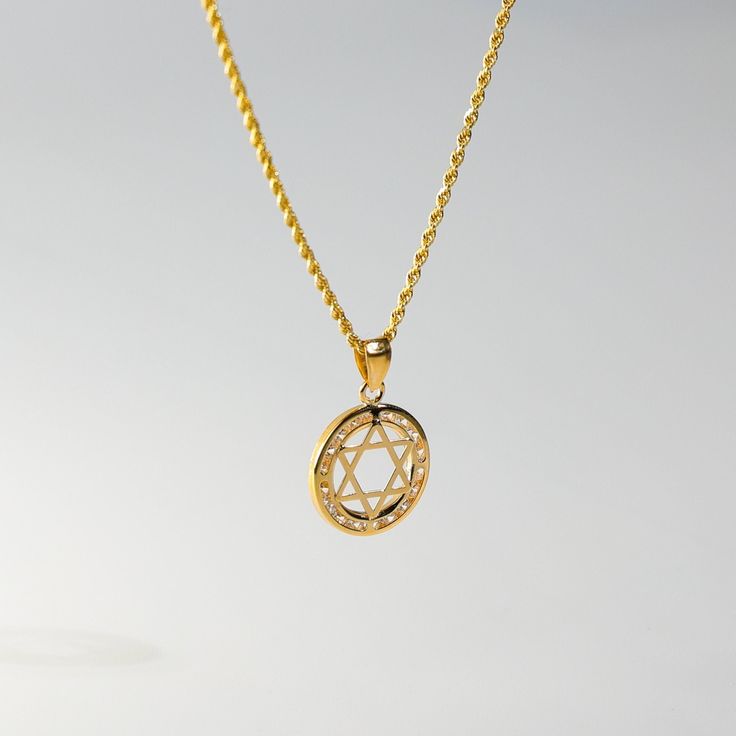 Fall in love with its captivating symmetry. This 14K solid gold handmade star of David pendant is a must-have for anyone who pays attention to even the smallest of details. A quick inspection of the piece will make you admire over the 30 years of experience we bring with every handcrafted pendant we make. This one is no exception as the edges, the points, and its overall appeal genuinely captures the aura of one of the most popular Jewish symbols. Send it as a gift or add it to your collection o Spiritual Yellow Gold Necklace With Star Charm, Symbolic Gold Star Necklace, Yellow Gold Star Of David Necklace, Yellow Gold Star Of David Necklace With Polished Finish, Spiritual Yellow Gold Star Jewelry, Spiritual Yellow Gold Star Of David Necklace, Gold Star-shaped Jewelry With Diamond Cut, Gold Star-shaped Diamond Cut Jewelry, Gold Star Of David Necklace For Anniversary