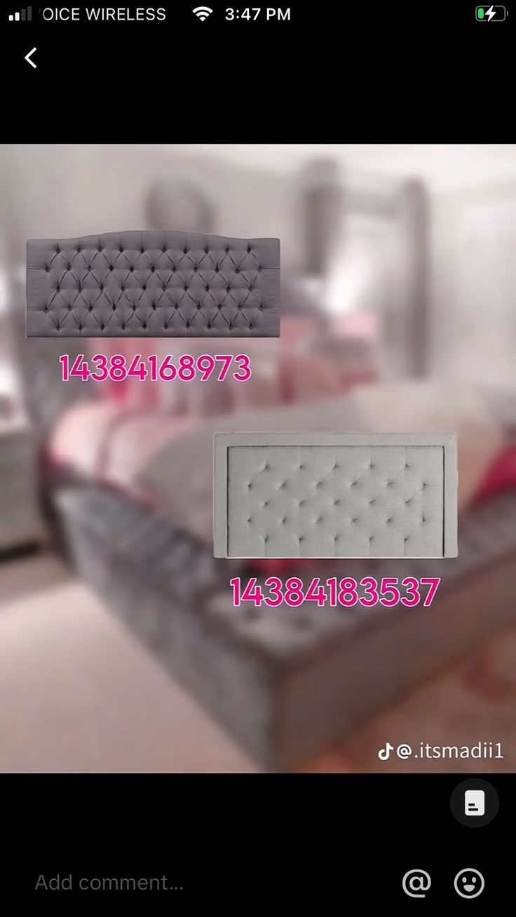 the bed is made up and has two pillows on it, one for each side