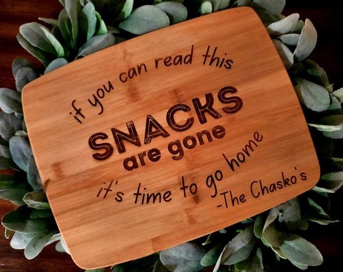 a wooden sign that says if you can read this snacks are gone it's time to go home