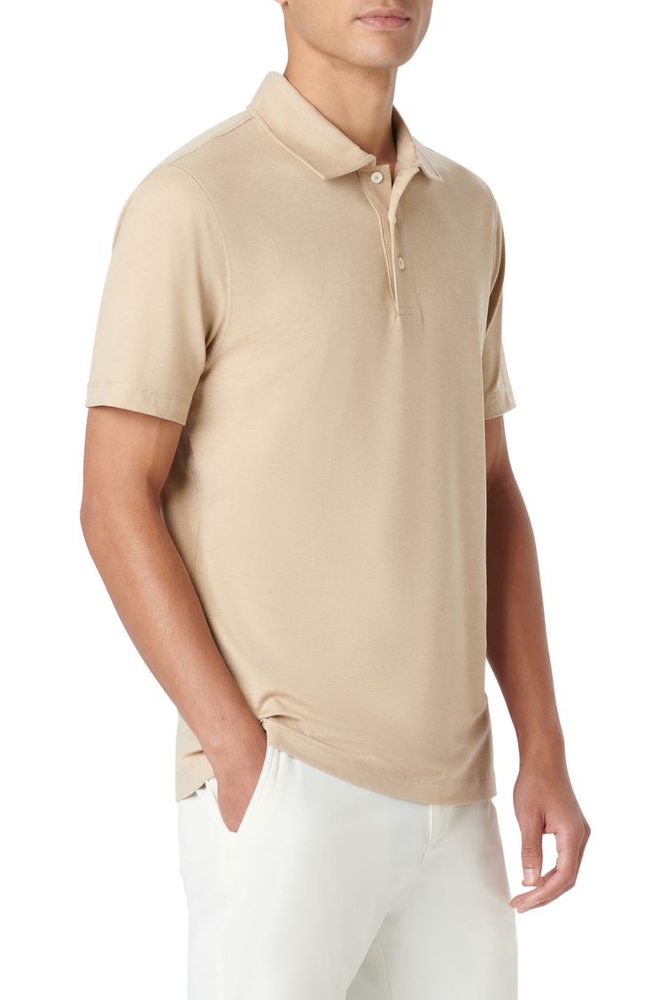 Fend off the sun's rays in this polo made from stretchy performance fabric with UPF sun protection. 28" length Button half-placket Spread collar Short sleeves UPF 50+ sun protection 88% polyester, 12% spandex Machine wash, dry flat Imported Beige Collared Polo Shirt For Summer, Summer Polo Shirt With Seamless Collar In Relaxed Fit, Summer Polo Shirt With Seamless Collar And Relaxed Fit, Summer Polo Shirt With Relaxed Fit And Seamless Collar, Summer Relaxed Fit Polo Shirt With Seamless Collar, Summer Cotton Moisture-wicking Polo Shirt, Summer Golf Polo Collar Top, Summer Golf Polo Top, 4-way Stretch Polo Shirt For Golf