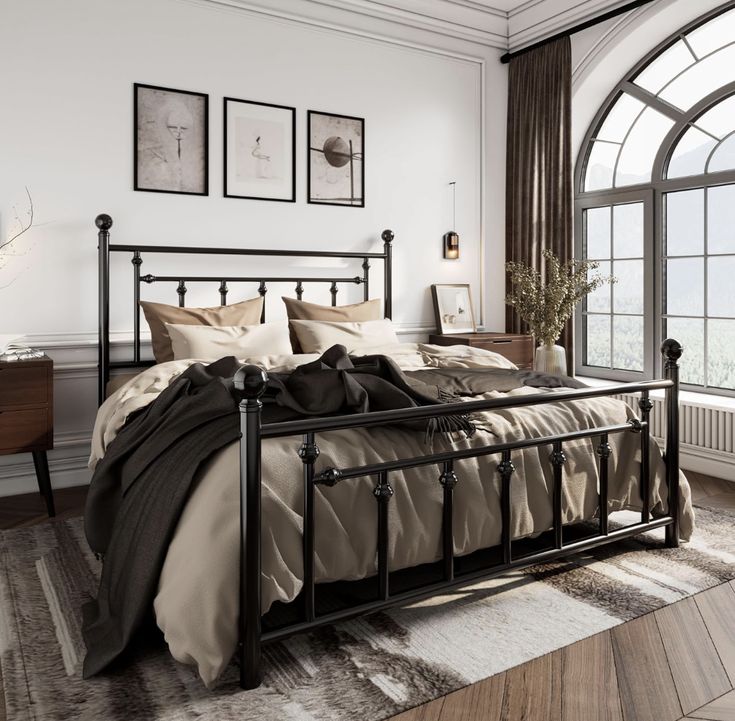 a bedroom with a large bed and lots of windows