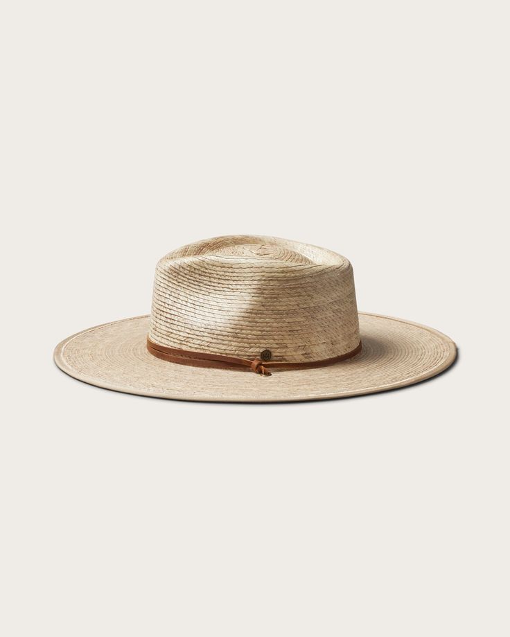 Discover the perfect blend of style and practicality with our Morro Fedora, handwoven by artisans from 100% tripilla palm straw. This lightweight accessory features a low depth fedora crown and an adjustable leather drawstring, making it an ideal choice for beachgoers and pool loungers alike. Artisan Adjustable Panama Hat For Vacation, Artisan Adjustable Panama Hat For The Beach, Natural Straw Boater Hat For Travel, Artisan Toquilla Straw Fedora For Beach, Travel Straw Boater Hat In Natural Color, Adjustable Natural Color Boater Hat For Everyday, Natural Boater Hat With Flat Brim For Everyday, Adjustable Natural Boater Hat For Everyday, Natural Adjustable Boater Hat For Everyday