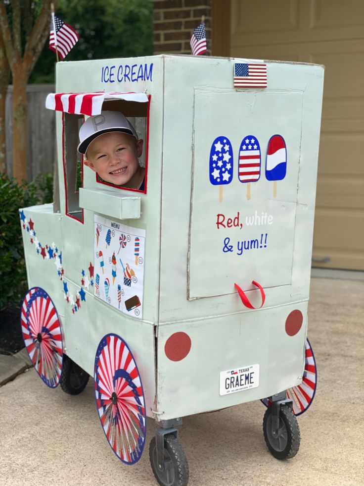 a child's ice cream cart costume for the fourth of july with an american flag theme