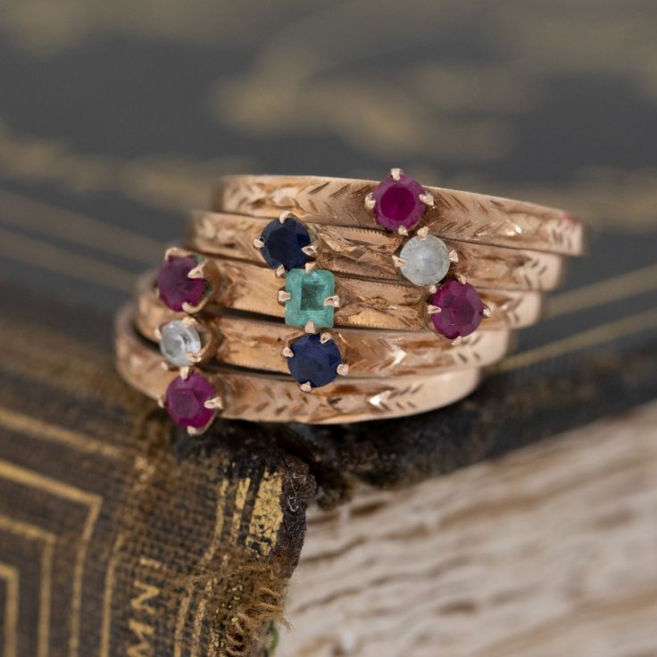 Harem rings come to us from the Victorian era, with a few different theories as to how they came into existence. They are made from 5 smaller bands. All mechanically joined together to create one wider band, often dotted with baby gemstones for a “confetti” appearance. Ours is in vintage rose gold, with the juiciest and brightest little gemstones! This ring is perfect for one who loves to fidget and play with their jewelry - the bands all individually hinge and move around in the most fun way. 1 Harem Rings, Modern Mens Rings, Art Jewelry Earrings, Vintage Rose Gold, Bespoke Rings, Antique Watches, Antique Engagement, Antique Engagement Rings, The Victorian Era