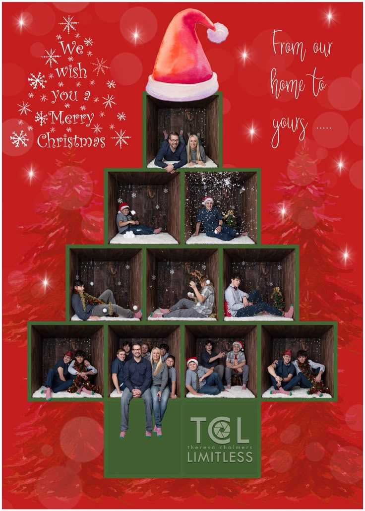 a group of people sitting on top of a christmas tree with santa's hat