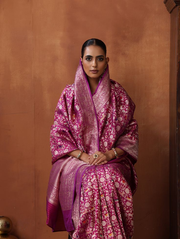 Adorn yourself in Khinkhwab's Shikargah Katan Silk saree, a fusion of luxurious Katan silk and intricate Shikargah motifs. This opulent creation is a statement of elegance, blending tradition and sophistication seamlessly. Embrace the allure of heritage with every thread, making this saree a timeless celebration of beauty. The Shikargah saree from Khinkhwab is not just a garment; it's a celebration of heritage and timeless beauty. Ceremonial Silk Saree With Meenakari Detail, Ceremonial Silk Saree With Meenakari, Ceremonial Handloom Jamawar Saree, Ceremonial Meenakari Tussar Silk Saree, Ceremonial Silk Dupatta With Meenakari, Ceremonial Meenakari Tussar Silk Traditional Wear, Silk Pre-draped Saree With Meenakari For Eid, Eid Meenakari Silk Pre-draped Saree, Eid Silk Pre-draped Saree With Meenakari