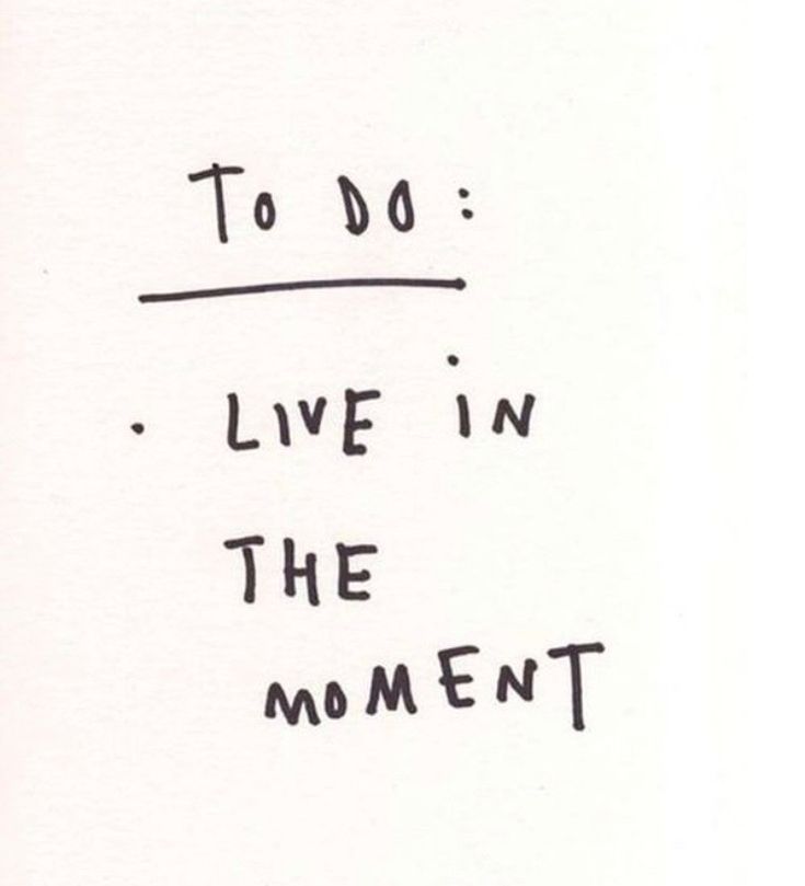 the words to do live in the moment are written on a piece of white paper