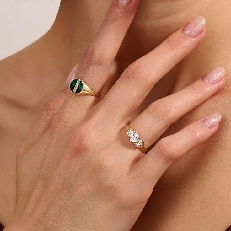 Radiate sophistication with our Green Enamel Line Pave Signet Ring. The surface of the ring finished with green and decorated with sparkling line, creating a modern yet timeless aesthetic. This versatile piece effortlessly elevates any style, making it a must-have for those who seek a touch of sophisticaiton and a pop of color in their accessories. - Made in 14k solid gold - Decorated with handset white cubic zirconia stone - Finished with Green Enamel - Band Width: 1.55 mm / 0.06 inches -Top Wi Modern Green Diamond Wedding Ring, Fine Jewelry Green Channel Set, Fine Jewelry With Channel Set Green Stones, Fine Green Jewelry With Channel Set, Luxury Green Rings With Diamond Accents, Elegant Green Enamel Ring With Polished Finish, Classic Green Open Signet Ring, Modern Green Diamond Promise Ring, Green Channel Set Fine Jewelry