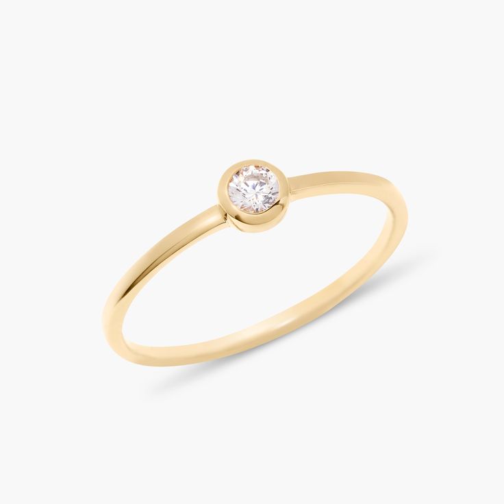 Introducing the Eden Vermeil Birthstone Ring! This one-of-a-kind ring features a custom gold band with a stunning birthstone for a truly unique and personal touch. Perfect for adding a little sparkle and personality to any outfit. Available in 14k gold vermeil Band width: 1mm 3mm cubic zirconia stone NOTE ﻿- Birthstone color may slightly vary per the color chart. SKU: BYR1132 Adjustable Classic Birthstone Open Ring, Adjustable Classic Open Birthstone Ring, Everyday Fine Jewelry Diamond Birthstone Ring, Classic Everyday Birthstone Rings, Everyday Diamond Solitaire Birthstone Ring, Diamond Round Birthstone Ring, Gold Crystal Birthstone Ring For Promise, Gold Diamond Ring With Birthstone For Everyday, Adjustable Stackable Rings With Single Diamond