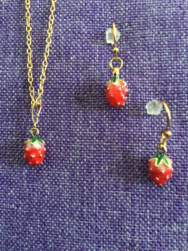 (11,626) Strawberry Necklace or Earrings  Made from gold alloy, 7/8" x 3/8" Earrings on gold tone ear wires Necklace on 18" gold tone chain They're really very cute! Cute Gold Dangle Jewelry, Cute Gold Metal Necklace, Cute Gold Pendant Jewelry, Nickel-free Cute Jewelry For Party, Cute Gold Dangle Necklaces, Cute Gold Jewelry For Pierced Ears, Cute Gold Jewelry With Matching Earrings, Gold Costume Jewelry Earrings For Gift, Cute Nickel-free Gold Necklaces