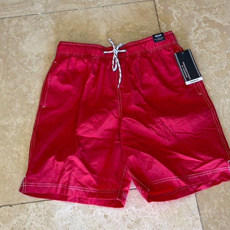 Mens Swim Shorts. Brand New. Tags On. Red. Size M Red Bottoms With Pockets For Vacation, Red Vacation Bottoms With Pockets, Casual University Red Bottoms For Summer, Casual University Red Summer Bottoms, University Red Short Bottoms For Summer, Sporty Red Bottoms For Vacation, Red Swim Trunks With Elastic Waistband For Vacation, Summer Red Shorts, Red Casual Swim Trunks With Elastic Waistband