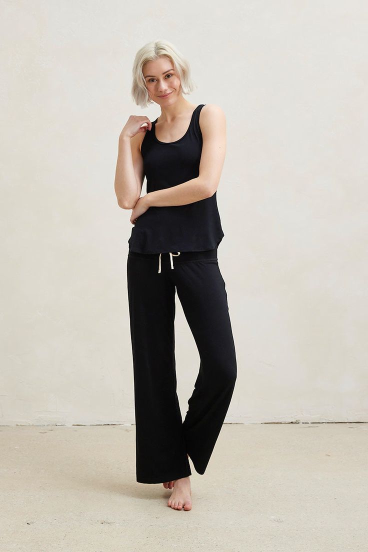 Loungewear Made For Your Comfort. Our ultra-soft, stretchy, and form-fitting tank top paired with our classic long pajama pant with wide drawstring closure waistband. Made from our signature ultra-soft and moisture-wicking fabric blend. Includes a Tank Top and Pajama Pants. Made in Canada. 93% Viscose from Bamboo / 7% Spandex. XS (0-2), S (0/2-4/6), M (6-8/10), L (10-12/14), XL (14-16/18), XXL (18-20/22). Machine washable & dryer friendly. Fabric patterns designed by and exclusive to This Is J. Relaxed Stretch Activewear For Lounging, Casual Sleeveless Activewear For Relaxation, Relaxed Loungewear Activewear Pants, Versatile Sleeveless Activewear For Loungewear, Comfortable Black Sweatpants For Relaxation, Versatile Everyday Activewear Long Pants, Comfortable Black Activewear For Relaxation, Versatile Relaxed Fit Tank Top For Loungewear, Solid Long Pants For Loungewear