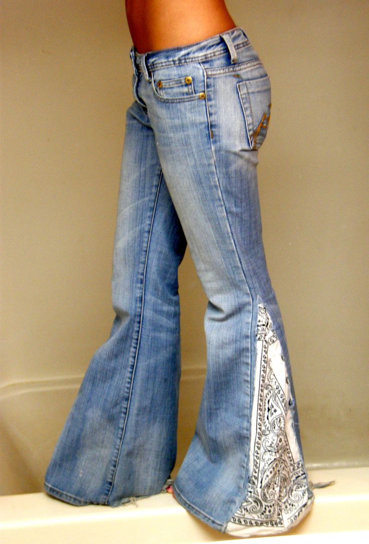 a woman's legs and jeans in the bathtub