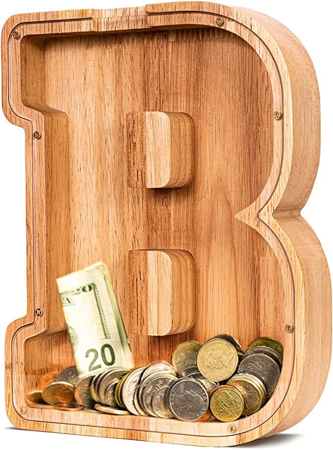 the letter b is made out of wood and has money in it