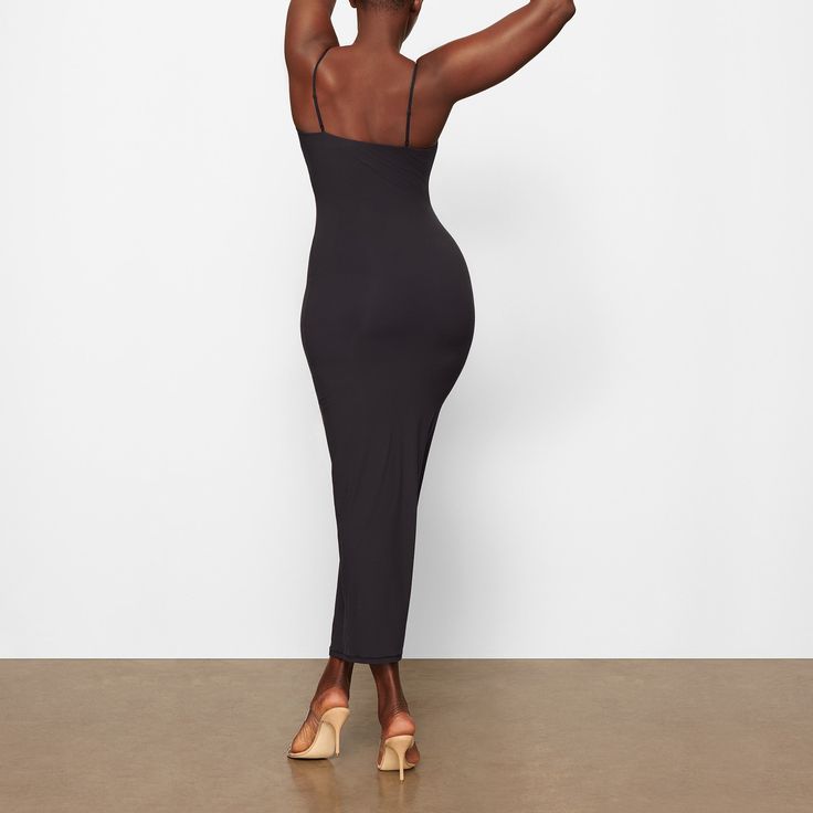 Everything you love about our signature Fits Everybody collection, now in an ultra-flattering dress. This double-lined silhouette is made to hug your body and offer a snatched, smoothed look. Fits true to size. | SKIMS Long Slip Dress | Black | 2XS | Fits Everybody Stretch Midi Dress With Built-in Bra For Date Night, Stretch Midi Dress With Built-in Bra For Night Out, Fitted Maxi Dress With Built-in Bra For Night Out, Elegant Fitted Midi Dress With Built-in Bra, Midi Bodycon Dress With Built-in Bra For Date Night, Chic Seamless Bodycon Maxi Dress, Fitted Midi Dress With Built-in Bra, Elastane Bodycon Dress With Built-in Bra For Date Night, Bodycon Dress With Built-in Bra For Date Night