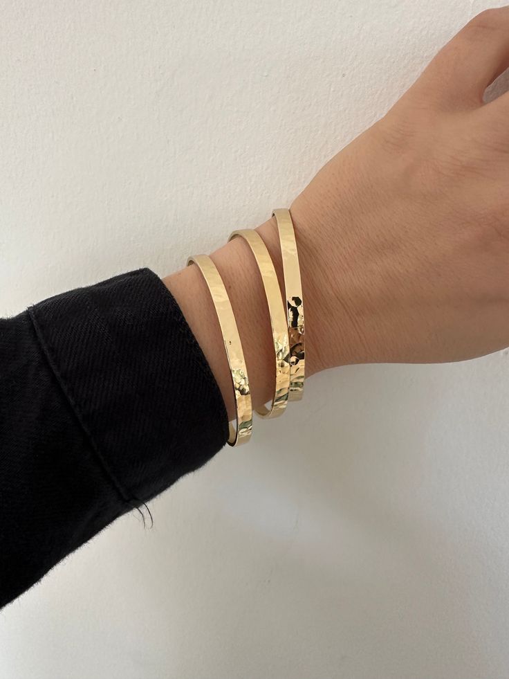 4.8mm wide recycled brass hammered bangleMeasures 2.63 inch diameterFinishes available:14K Yellow GoldRhodium (silver) Hammered Bangles, Laptop Tote Bag, Vegan Leather Bag, Wide Rings, Woven Bag, Market Bag, Ring Bracelet, Earring Necklace, Ring Necklace