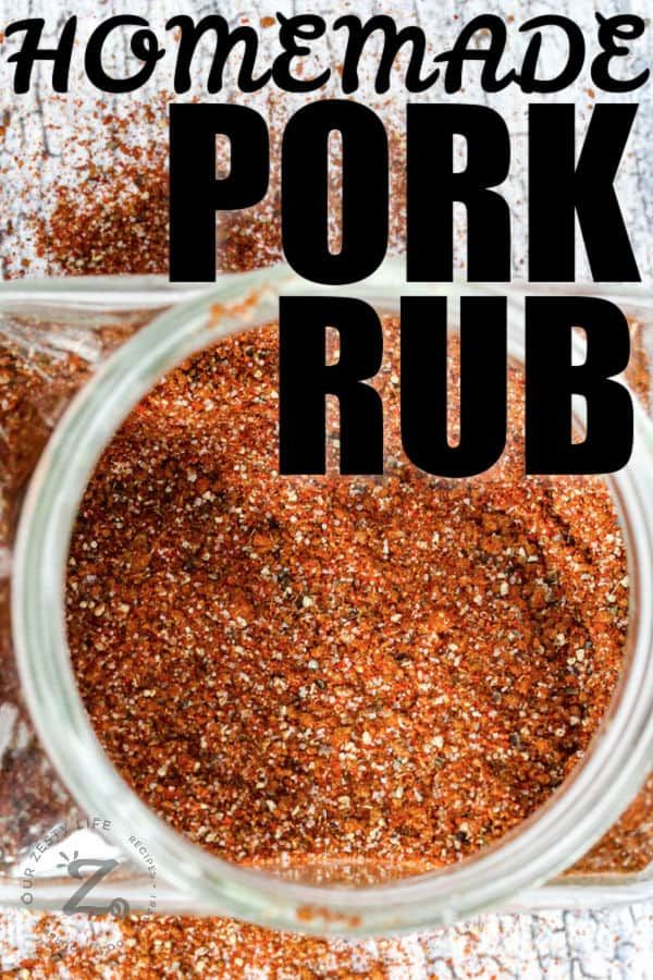 homemade pork rub in a glass jar with the words homemade pork rub above it on top