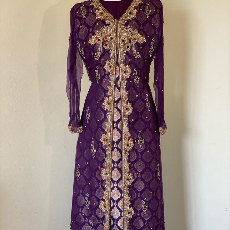 Beautiful Pakistani/Indian Shalwar Kameez With Handwork. Semi-stitched Long Formal Dresses, Elegant Long Transitional Dresses, Elegant Purple Kurta With Pallu, Traditional Purple Kaftan For Festive Occasions, Formal Embroidered Dress With Zari Work For Eid, Anarkali Style Fitted Party Kaftan, Festive Fitted Kaftan With Zari Work, Fitted Festive Kaftan With Zari Work, Fitted Bollywood Kaftan With Dabka Work