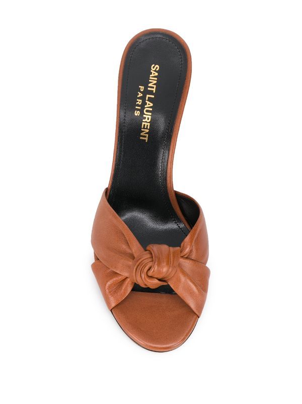 Shop Saint Laurent Bianca twisted 80mm mules with Express Delivery - FARFETCH Saint Laurent Shoes, Leather Mules, Mid Heel, Mules Shoes, Slip On Sandal, Open Toe, Life Is, Brown Leather, Saint Laurent