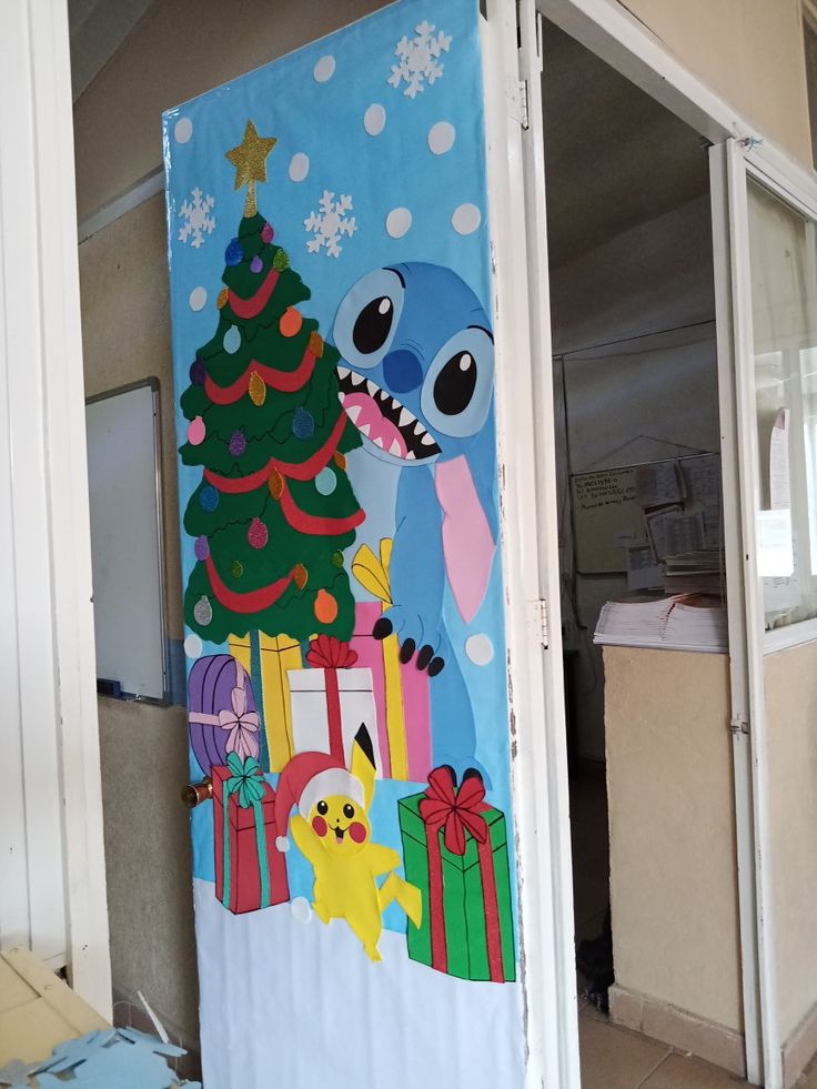 the door is decorated with an image of a shark and christmas tree