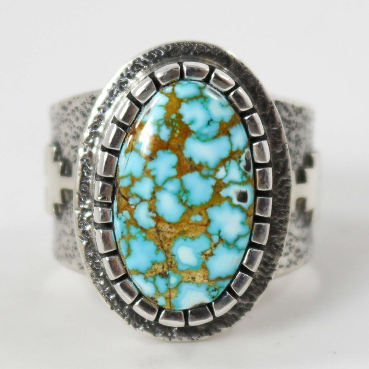 Sterling Silver Ring with Appliqué Designs and set with Natural Kingman Turquoise from Arizona. Ring Size: 11.625” Setting Width, .875” Setting Height.5” Band Width Bohemian Hallmarked Turquoise Ring, Western-style Turquoise Ring With Patina, Heirloom Style Silver Turquoise Ring Collectible, Western Sterling Silver Gemstone Ring, Heirloom Style Turquoise Sterling Silver Ring, Western Style Sterling Silver Gemstone Ring, Heirloom Silver Turquoise Ring, Southwestern Style Turquoise Inlay Ring, Heirloom Turquoise Ring For Collectors