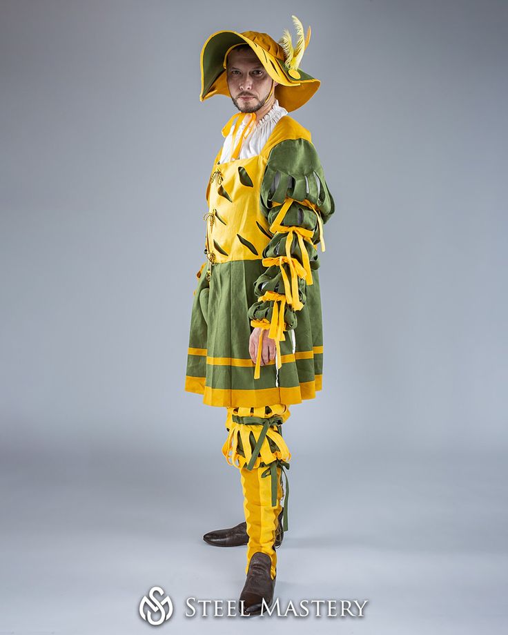 This costume of landsknecht of the XV century is based on the picture of Hans Leonhard Schaufelein "Dancers at a Wedding". Costume is made from 100% cotton.  Costume consists of: Hat. It is fixed with fabric strap under the chin. Doublet with cuts.  It has thigh-length skirt, and puffed sleeves with cuts, which are decorated with bows. Fastened from the front with lacing with brass points. Breeches with cuts. . Have a codpiece, which is attached by lacing with brass points. Legs of breeches can be tighten under the knee with fabric straps. Short chausses. . Have lacing on the back side of calf for better fitting on the leg. Linen fabric will add 110 EUR to the sum Historical Design Costume For Cosplay At Medieval Festivals, Medieval Costumes With Historical Design For Cosplay, Medieval Cosplay Costume With Historical Design, Historical Costume For Medieval Festivals With Historical Design, Medieval Costume For Fantasy Events, Medieval Costume For Medieval Festivals And Costume Parties, Medieval Style Costumes For Costume Parties And Festivals, Viking Costume For Medieval Festivals And Costume Parties, Medieval Costume For Medieval Festivals