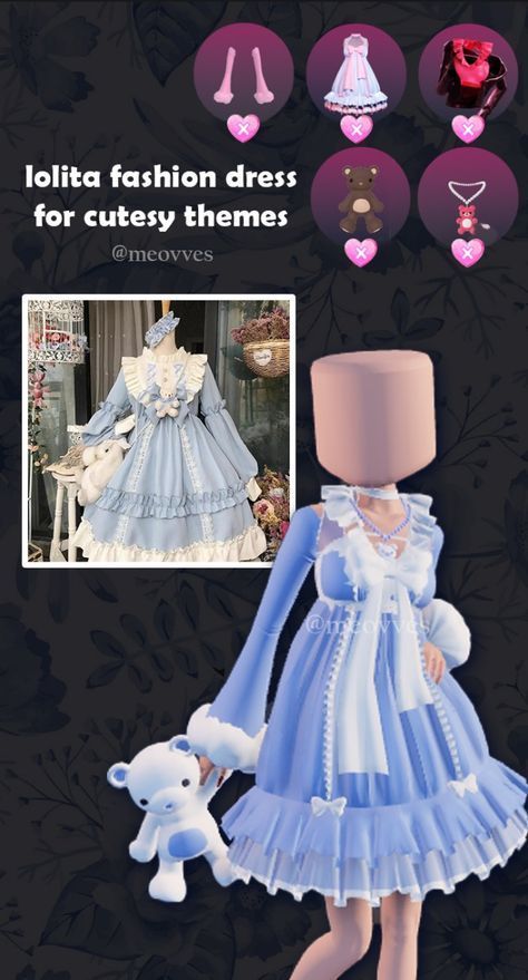 the doll is wearing a blue dress and holding a teddy bear