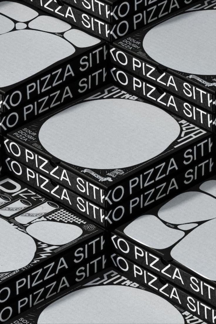 black and white photograph of pizza boxes stacked on top of each other with the words'sitio'printed on them