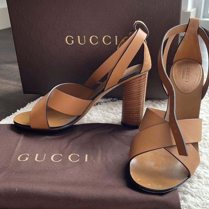 Gucci Sandals In Camel Color, Block Heel 4.1” Soft Leather, Leather Sole. Made In Italy. Come With Original Travel Bag And Gucci Box. Perfect Condition, They Look Brand New Except For Bottom. Worn Once Only. Original Price $864 Gucci Open Toe Calf Leather Sandals, Gucci Calf Leather Open Toe Sandals, Gucci Leather Sandals With Branded Heel Counter, Gucci Ankle Strap Leather Sandals, Gucci Summer Calf Leather Sandals, Gucci Calf Leather Sandals For Summer, Gucci Calf Leather Sandals For Evening Wear, Elegant Gucci Calf Leather Sandals, Luxury Brown Heels With Wrapped Heel